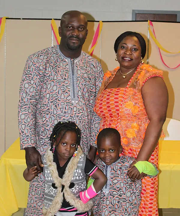 Uchenna Gerald Igwe, his wife and two kids at a younger age